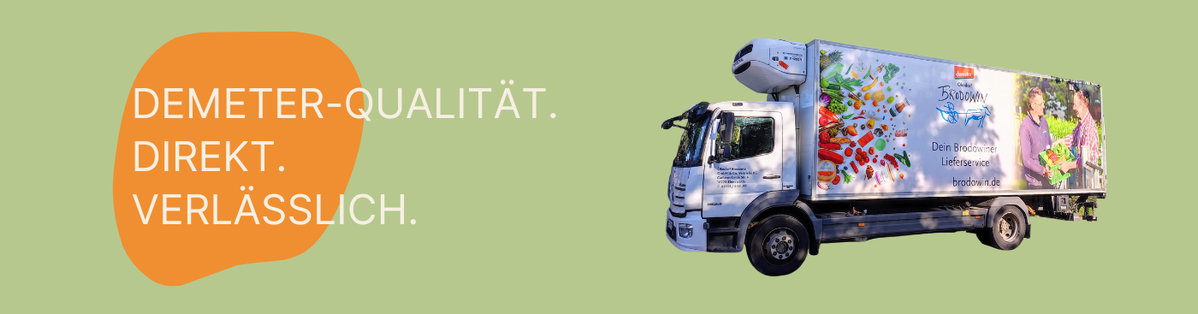 KI generiert: Ein Transporter mit dem Text: "DEMETER-QUALITÄT. DIREKT. VERLÄSSLICH." auf grünem Hintergrund.